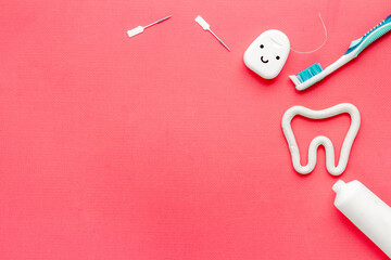 Teeth care and dental hygiene. Toothbrush with tube of toothpaste, flat lay