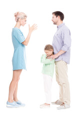 Vertical full length side view studio shot of husband and wife having conflict quarrelling, their daughter feeling sad about it, white background