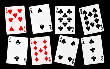 Classic playing cards for poker and gambling, isolated on black background, clipping path