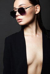 fashion portrait of Beautiful sexy woman in sunglasses