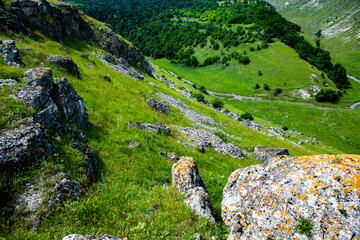 Beautiful green landscapes with hills, forest and rocks in Moldova. Eco tourism without people.