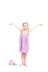 Vertical full length studio portrait of happy cute Caucasian girl wearing summer outfit posing on camera, white background
