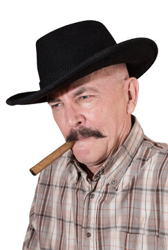 The cowboy with mustache, in a black hat smoking a cigar