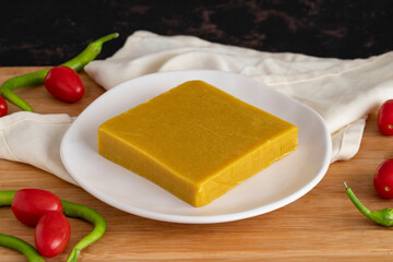 Almond halva. Halva on wooden background. Turkish halvah for Breakfast. Local name badem helvası