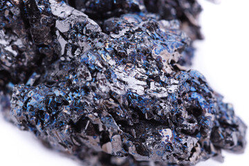 Macro mineral stone covellite on white background