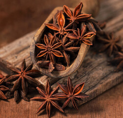 star anise in wooden scoop