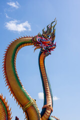 Udon Thani, Thailand - 21 June 2021 : Twin Stucco painted as a large serpent at Pra kai keaw wang nakin, Located at Ban Don swan, Phen District, Udon Thani, Thailand.