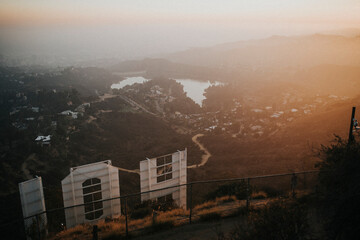 Behind the Hollywood sign with the view of Hollywood city - obrazy, fototapety, plakaty