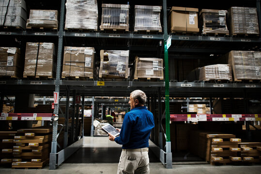 A Caucasian Man Checking Stock Inventory