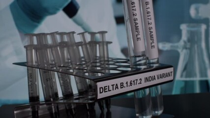 Delta B.1.617.2 Indian Variant Sample Test Tubes Being Removed From Rack. Locked Off