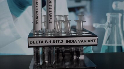 Delta B.1.617.2 Indian Variant Test Tube Samples Being Placed Into Rack. Locked Off