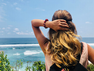 Fototapeta na wymiar Woman enjoying tropical beach view.