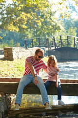 Daughter and father enjoying outdoors nature.