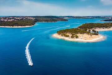 Fototapeta na wymiar Speed boat in Istria, Croatia island Adriatic Sea blue water 