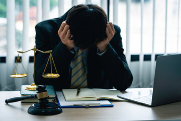 Lawyers or judges are stressed about unopening cases in the lawyer's office. legal advisor Scales...