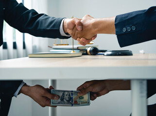 business people shaking hands and Give an under-the-table bribe to an attorney to help a lawyer win a court case. Bribery and Kickback Ideas Fraud and Fraud