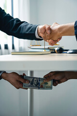 business people shaking hands and Give an under-the-table bribe to an attorney to help a lawyer win a court case. Bribery and Kickback Ideas Fraud and Fraud