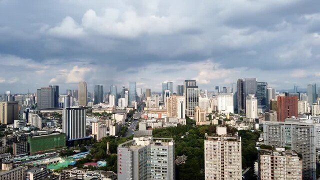Chengdu, Sichuan province, China - June 28, 2021 : Chengdu city downtown skyline moving timelapse