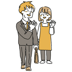 夫を見送る主婦