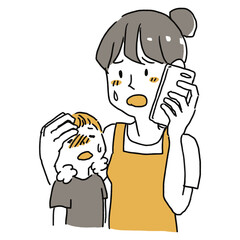 子供が熱を出して電話をしている女性
