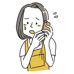 電話しながら困った顔をしている女性