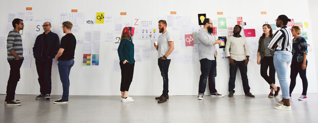 Group of diverse people attending startup business course