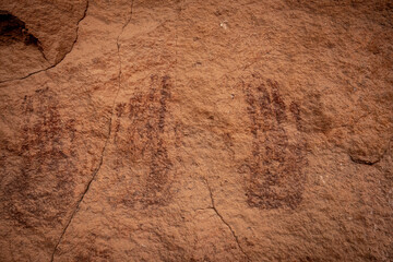 Multiple Pictograph Handprints On Sandstone Wall