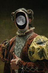 Model like medieval royalty person in vintage clothing. Concept of comparison of eras, artwork,...