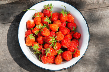 strawberries in a cup close-up top view