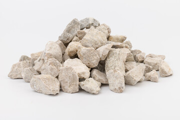 Gray small rocks ground texture isolated on white background. Small road stone.
