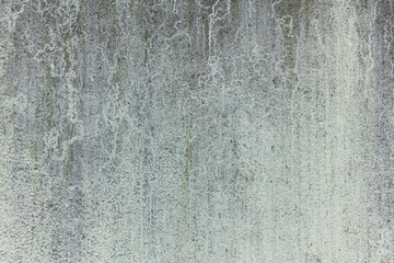 Texture of an old concrete wall with traces of mold and mildew. Industrial minimalistic background