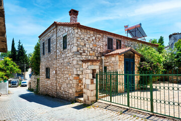 Exterior of a traditional stone house in Urla, İzmir, Turkey.