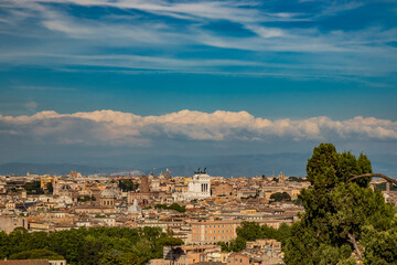 Obraz premium Rome, Lazio, Italy - The beautiful panorama of the city, seen from the top of the Janiculum (Janiculum). The splendid view of the historic buildings, churches and unique monuments of the Eternal City.