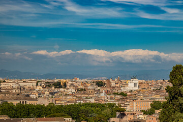 Obraz premium Rome, Lazio, Italy - The beautiful panorama of the city, seen from the top of the Janiculum (Janiculum). The splendid view of the historic buildings, churches and unique monuments of the Eternal City.