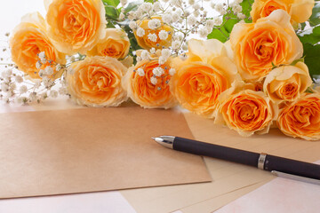 メッセージ（オレンジ色のバラとカスミソウ）