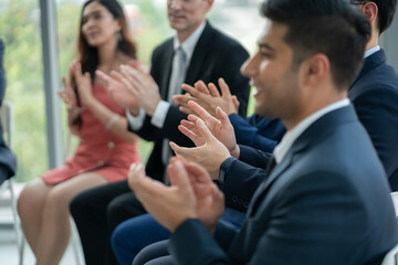 group of business people workshop training in business event at seminar room. business people applauding 