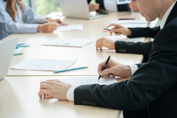 group of business people  working and disussing a project together at meeting room