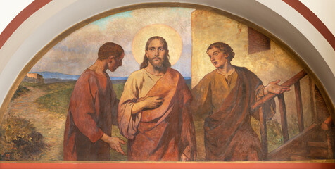 VIENNA, AUSTIRA - JUNI 18, 2021: The fresco of Jesus with the disciples of Emausy in Herz Jesu...
