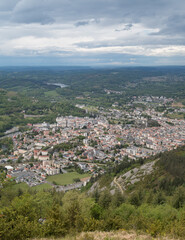 Fototapeta na wymiar Panoramic view of the town of Lourdes, Occitanie, Hautes-Pyrénées, France, from the Pic du Jer