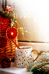 Christmas drink background banner, copy space. Hot cocoa chocolate in a beautiful mug on a Christmas background. 