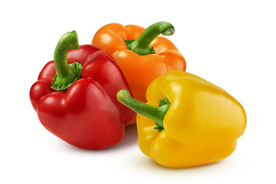 Red, orange and yellow sweet bell peppers isolated on white background