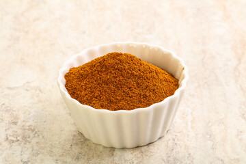 Dry Paprika powder in the bowl
