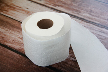 white toilet paper in a roll for hygiene