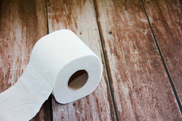 white toilet paper in a roll for hygiene