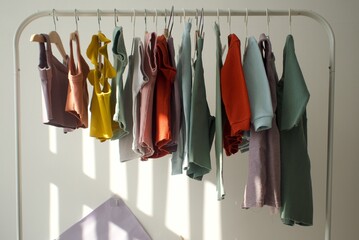 kids' ribbed clothes hang on hangers on the rail