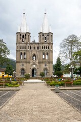 Fototapeta na wymiar Jardin, Antioquia, Colombia. October 15, 2020: Architecture and facade of the Basilica of the Immaculate Conception.