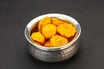 Marinated yellow patisson in the bowl