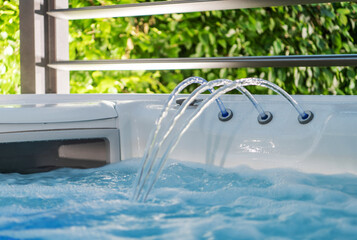 Hot Tub Jacuzzi Fountain and Skimmer Close Up - obrazy, fototapety, plakaty