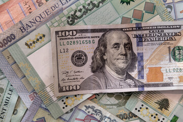 Lebanese Lira currency bills with 100 USD dollars