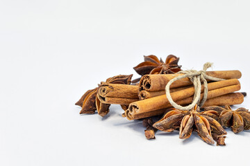 bunch of cinnamon and anise isolated on a white background. spices. background for text